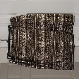 Festive black and gold Tahari skirt.